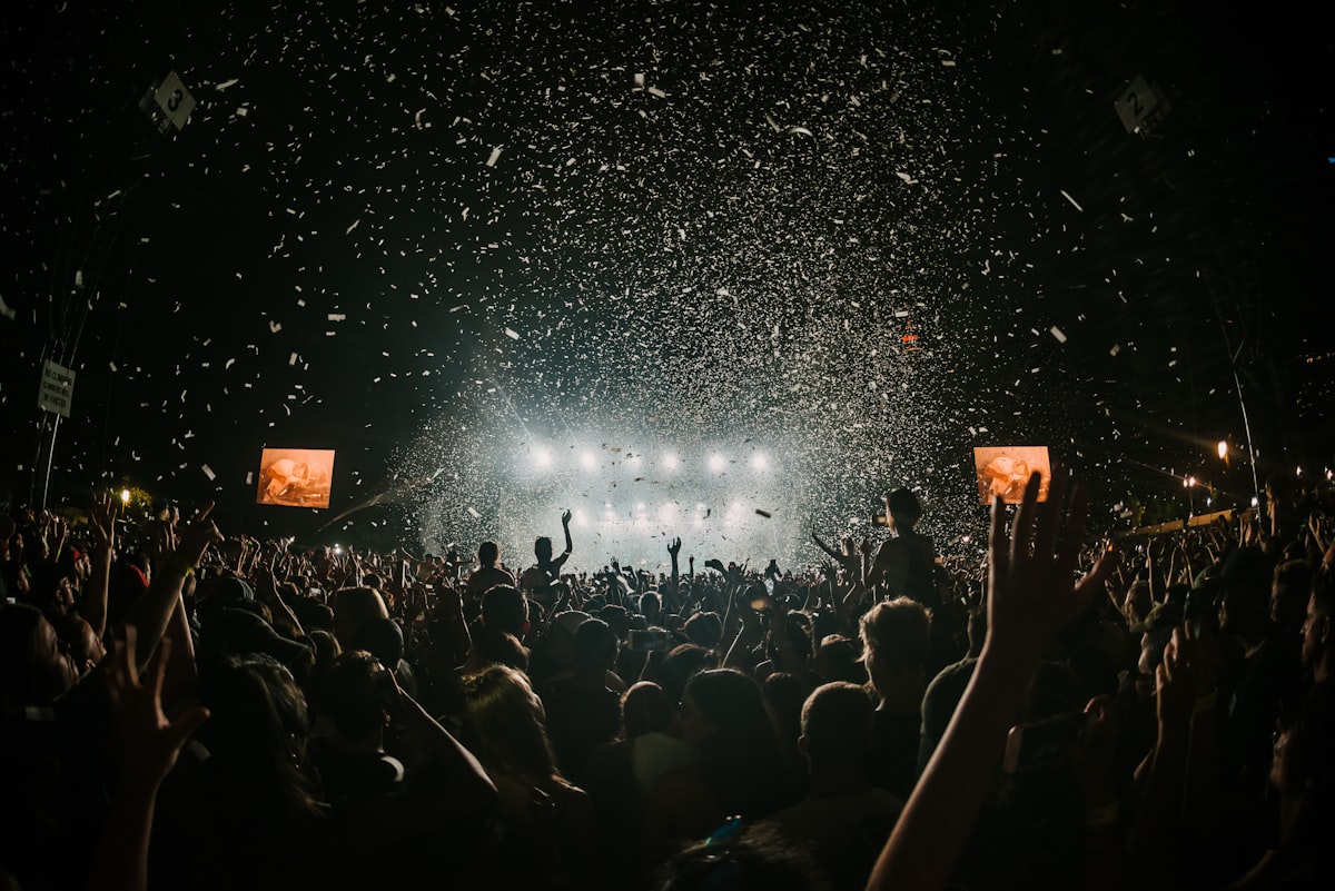 Outdoor festival at dusk — the kind of site where mobile signal comes and goes